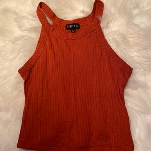 I’m selling a brown crop top .